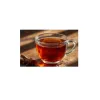Filiżanka naparu Rooibos Na Zdrowie obok lasek anyżu – idealny napój bez kofeiny na wieczór.