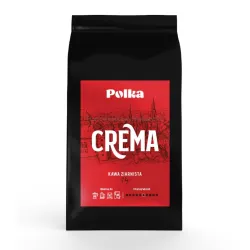 Opakowanie kawy ziarnistej POLKA Crema na tle drewnianego stołu, obok filiżanka espresso z gęstą pianką – dorotea.pl.