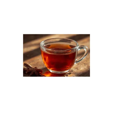 Filiżanka naparu Rooibos Na Zdrowie obok lasek anyżu – idealny napój bez kofeiny na wieczór.